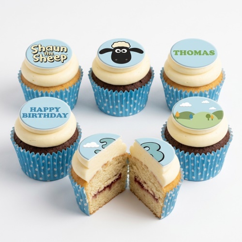 Shaun the Sheep themed cupcakes with character, logo, and landscape toppers.