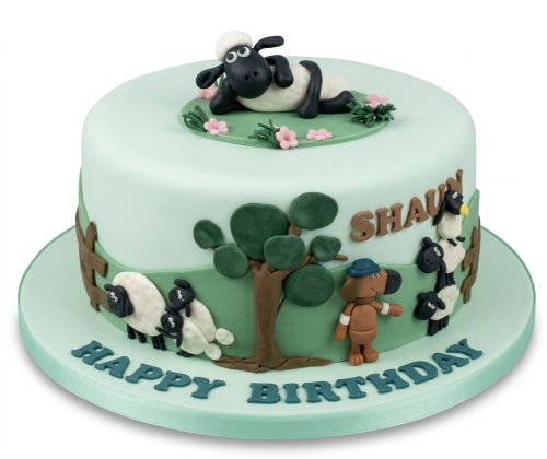 Shaun the Sheep themed birthday cake with Bitzer, sheep, fence, tree, and custom message.