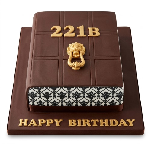 Brown rectangular cake resembling a book or door with gold '221B' and a lion head knocker, with 'Happy Birthday' on the board.