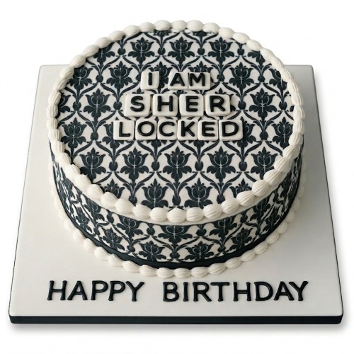 Round black and white Sherlock Holmes themed birthday cake with "I AM SHERLOCKED" in letter tiles and damask pattern.