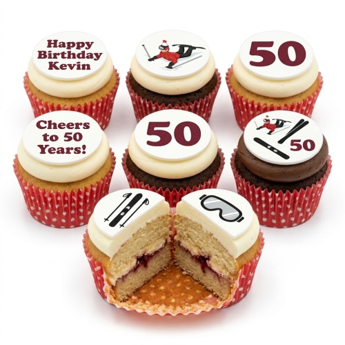 Skiing themed birthday cupcakes with custom age and personalised message toppers, featuring skiers, skis, and goggles.