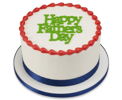 Round white cake with green 'Happy Father's Day' text, red teardrop border, and navy blue ribbon.