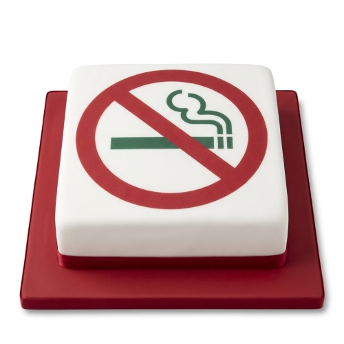 Square white cake with a red No Smoking symbol on top, on a red cake board.