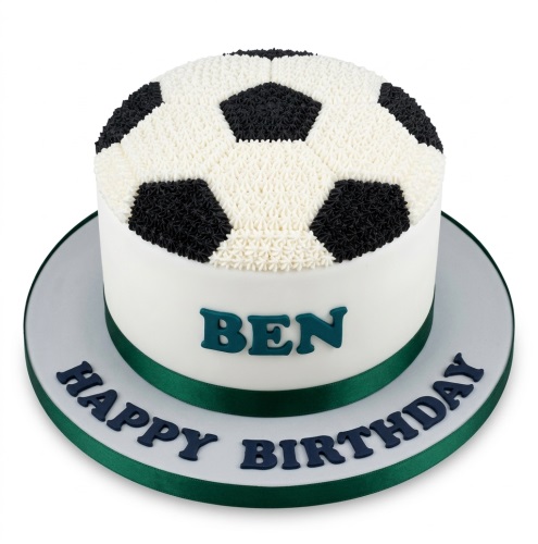 Round white cake with a black and white football design on top, green ribbon, and space for a personalised message.