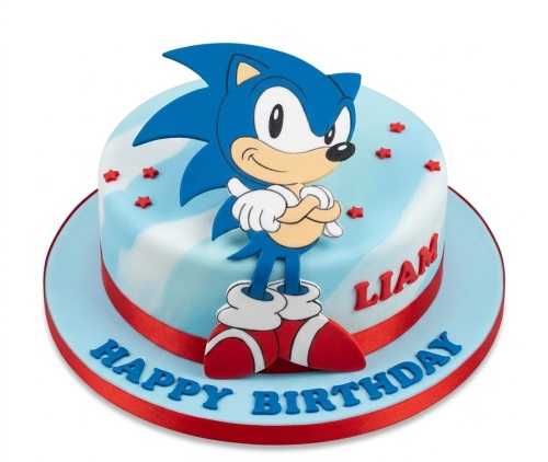 Round blue and white Sonic Hedgehog birthday cake with red stars and ribbon