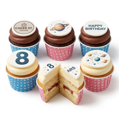 Assortment of space theme birthday cupcakes with planet and custom age toppers