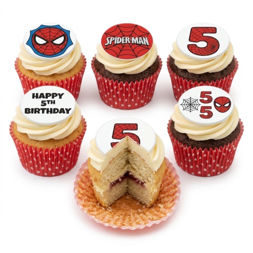 Spiderman themed cupcakes with red and blue toppers, spiderweb designs, and a custom age number.