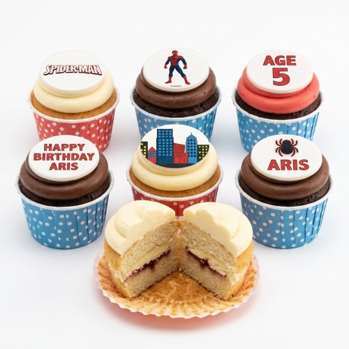 Selection of Spider-Man themed birthday cupcakes with cityscape and custom age toppers.