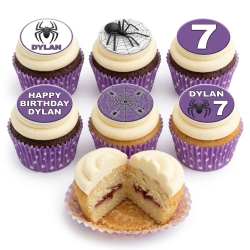 Cupcakes with purple wrappers, white frosting, and black spider and spiderweb toppers. Includes a custom age 7.