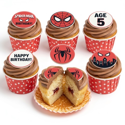 Spider-Man themed birthday cupcakes with red and black toppers, some showing Spider-Man face, spider logo, city skyline, and a custom age topper.