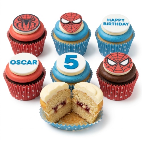 Spiderman themed cupcakes with red and blue frosting, featuring mask and web toppers.
