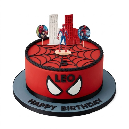 Red Spiderman themed round birthday cake with a Spiderman figure, building toppers, spiderweb design, Spiderman eye mask, and custom age topper.