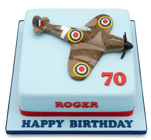 Light blue square birthday cake with a 3D fondant Spitfire plane, custom age, and personalised message.