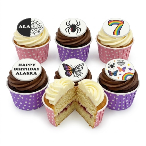 A selection of kids birthday cupcakes with white and chocolate frosting, featuring customisable toppers including spiders, butterflies, rainbows, and a custom age number.
