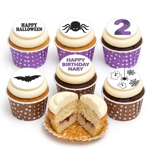 Orange and purple Halloween cupcakes with bats, a large spider, ghosts, spiderwebs, and a custom age topper.