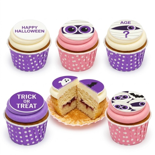 A selection of Halloween themed cupcakes with purple and pink frosting, featuring edible toppers with mummy eyes, ghosts, bats, 'Happy Halloween', 'Trick or Treat', and 'AGE ?' messages.