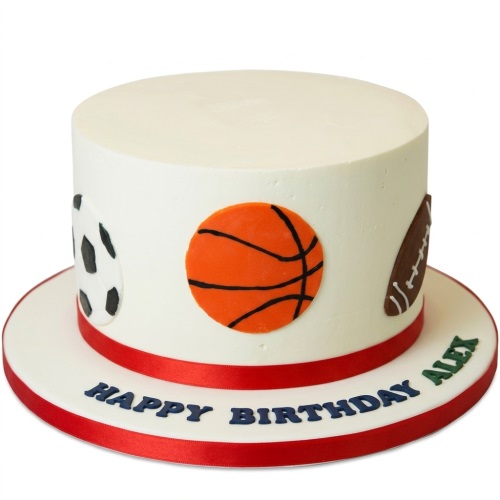 Round white birthday cake with edible football, basketball, and rugby ball decorations, and a red ribbon.