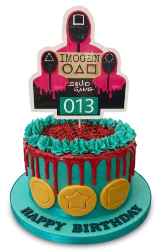 Round Squid Game birthday cake with red drip, Dalgona cookies, and custom topper.