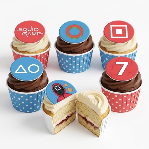Squid Game themed cupcakes with red and blue wrappers, featuring logo, shapes, masked guard, and custom age topper.
