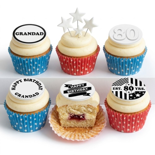 Six vanilla cupcakes with white frosting, red and blue polka dot cases, and customisable black and white birthday toppers including stars.