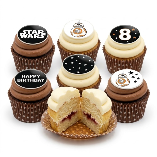 Star Wars themed cupcakes with BB-8 droid, Star Wars logo, stars, and a custom age topper on chocolate and vanilla frosted cupcakes.