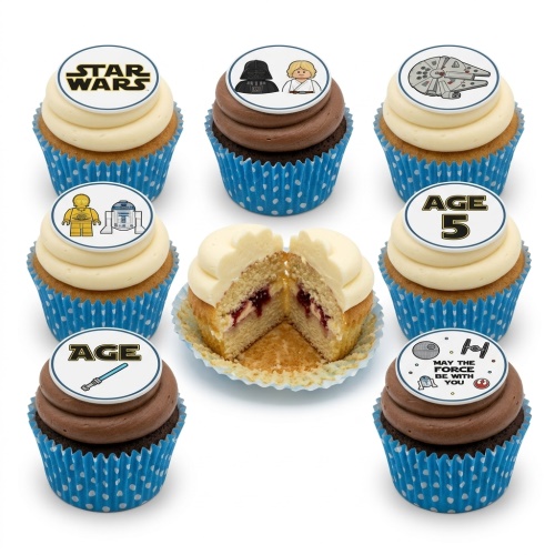 Star Wars themed cupcakes with white and chocolate frosting, blue polka dot cases, and edible toppers featuring characters, vehicles, and custom age.