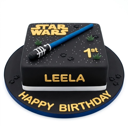 Black square Star Wars birthday cake with a blue lightsaber, logo, and star sprinkles.