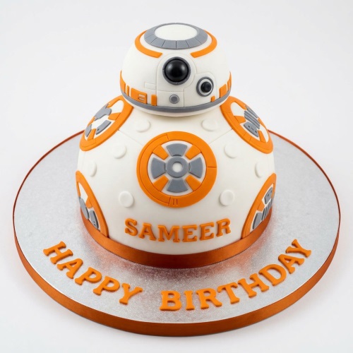 White and orange BB-8 droid birthday cake with custom message and name.