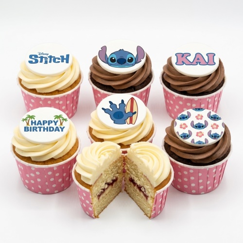 Disney Stitch themed birthday cupcakes with vanilla and chocolate frosting, some with 'Happy Birthday' and 'KAI' toppers.
