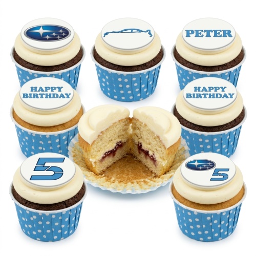 A selection of Subaru car theme birthday cupcakes with blue and white toppers, some showing the Subaru logo, a car outline, 'Happy Birthday', and a custom age '5'.