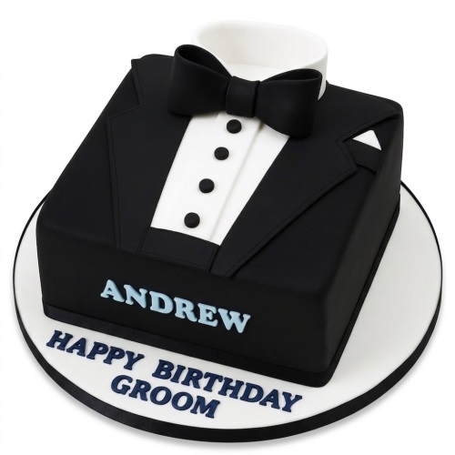 Black tuxedo suit birthday cake with white shirt, black bow tie, and custom message.