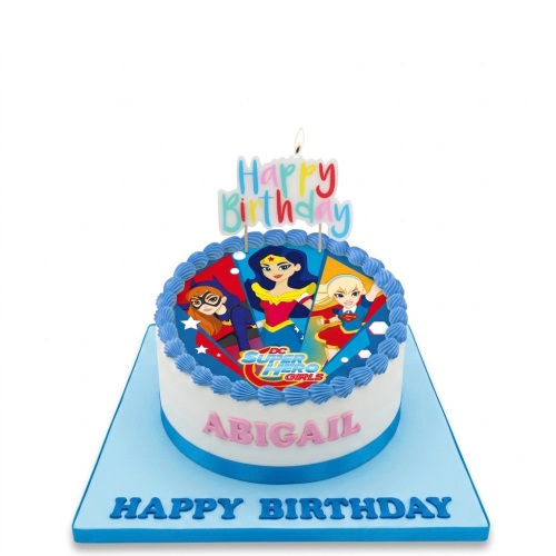 Round DC Super Hero Girls birthday cake with blue icing, featuring Wonder Woman, Batgirl, and Supergirl, with a personalised name.