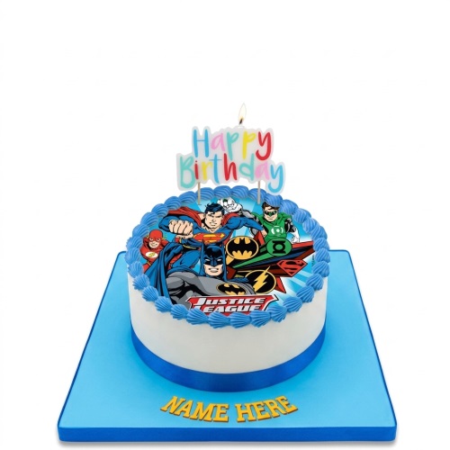 Round white Justice League birthday cake with blue icing and a 'Happy Birthday' candle topper.