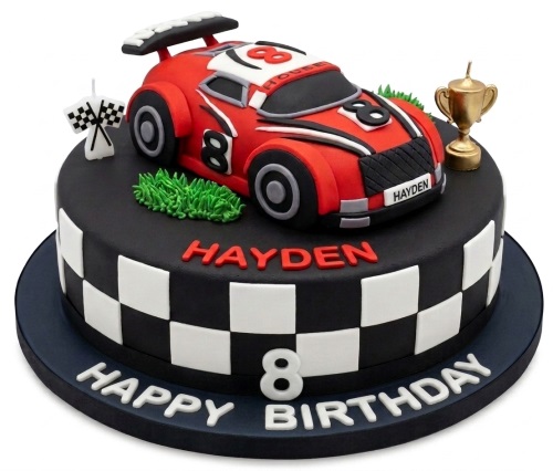Round black racing car birthday cake with red car topper, checkered flag, gold trophy, and custom age '8'.