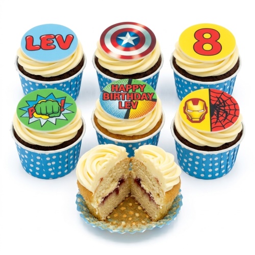 Set of superhero themed cupcakes with various hero logos including Captain America, Hulk, Iron Man, Spider-Man, and a custom age topper.