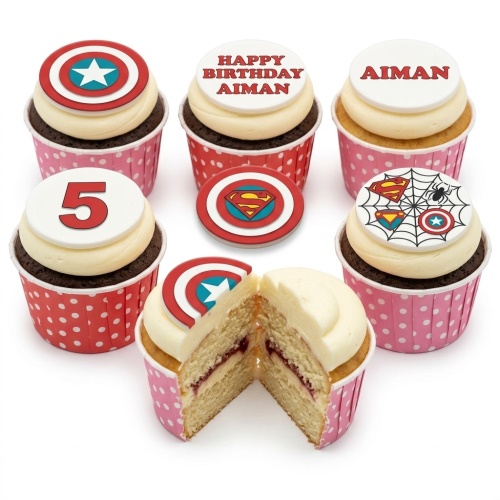 Superhero themed cupcakes with Captain America, Superman, and Spiderman toppers, some with custom age and messages.