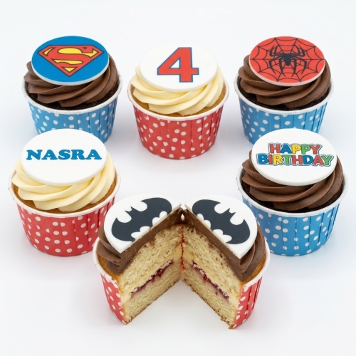 Superhero themed cupcakes with Superman, Spiderman, Batman logos, custom age topper, and personalised message.