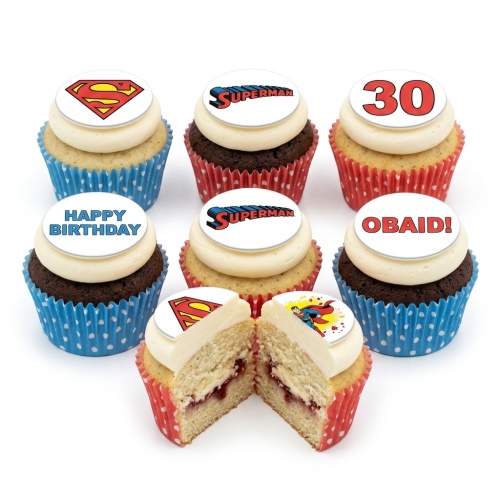 Superman themed birthday cupcakes with iconic logos and custom age/name toppers.