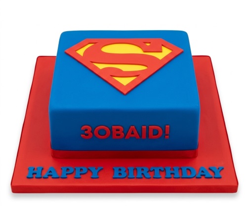 Square blue and red Superman themed birthday cake with the iconic 'S' shield logo.