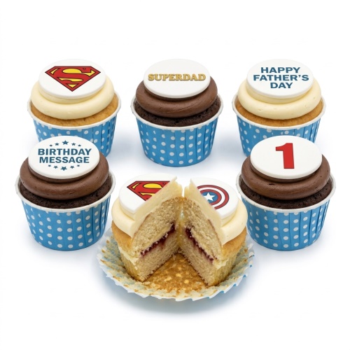 A set of superhero-themed cupcakes with Superman and Captain America shield toppers, 'Superdad', 'Happy Father's Day', 'Birthday Message', and custom age '1' toppers.