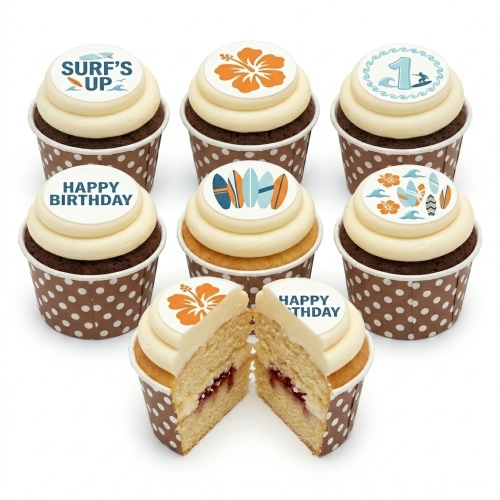 Cupcakes with surfing, surfboard, waves, hibiscus flower, and 'Happy Birthday' toppers in polka dot cases.