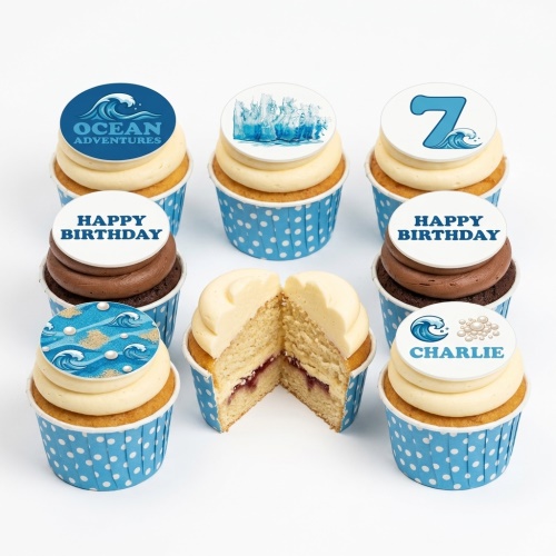 Ocean theme birthday cupcakes with blue wave toppers, sand, pearls, and custom age/name examples.