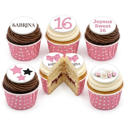 Assortment of pink and white birthday cupcakes with custom age, name, bow, stars, and floral toppers.
