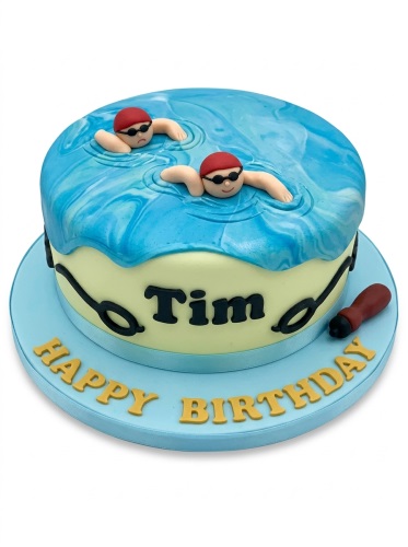 Round swimming pool themed birthday cake with two edible swimmers and a custom name.