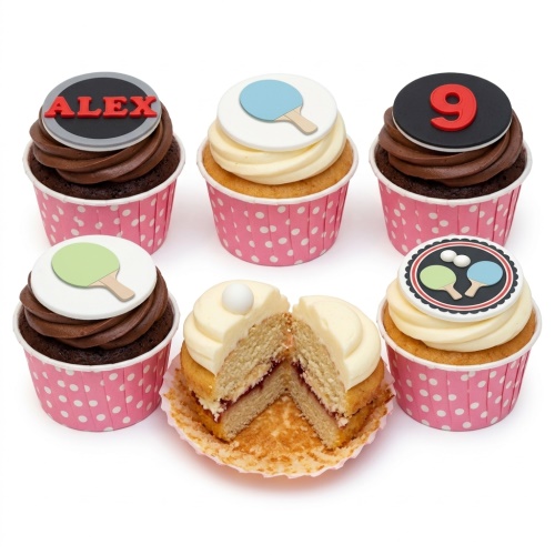 Table tennis themed cupcakes with edible bats, balls, and custom age topper.