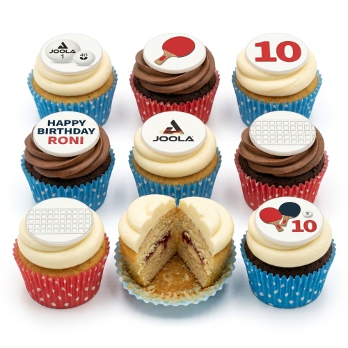 A set of table tennis themed birthday cupcakes with Joola logos, paddles, balls, and custom age and message toppers.