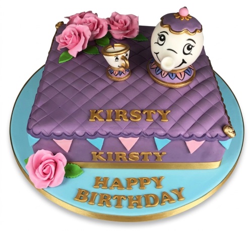 Purple quilted birthday cake with Mrs. Potts and Chip figurines, pink sugar roses, and gold lettering.