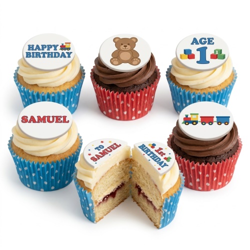 Vanilla and chocolate cupcakes with train, teddy bear, building blocks, and 1st birthday toppers.