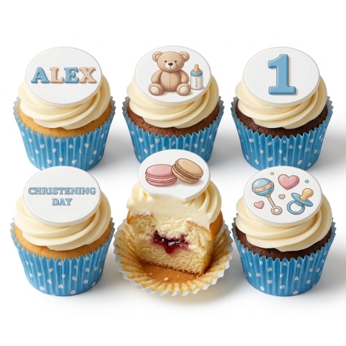 Round christening cupcakes with blue and peach ombre, white drip, 3D teddy bear, baby bottle, macarons, and a cupcakes pop.