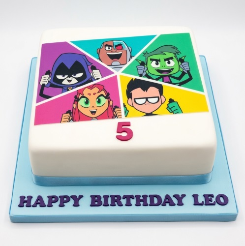 White square cake with Teen Titans Go! characters edible image and custom age topper.
